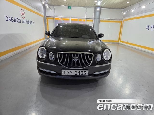 KIA OPIRUS PREMIUM 2010 — 129 589 км, чёрный, Корея — под ключ — фото 1