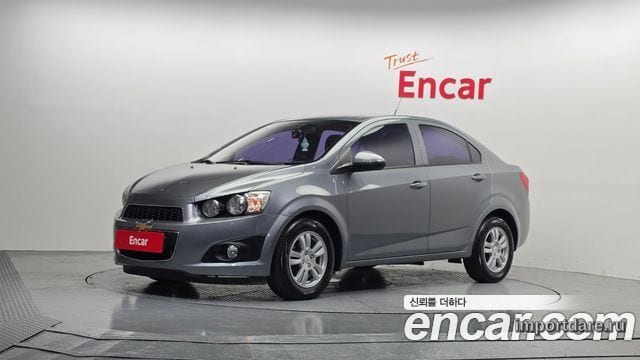 CHEVROLET AVEO SEDAN 2014 — 84 742 км, серебристо-серый, Корея — под ключ — фото 1