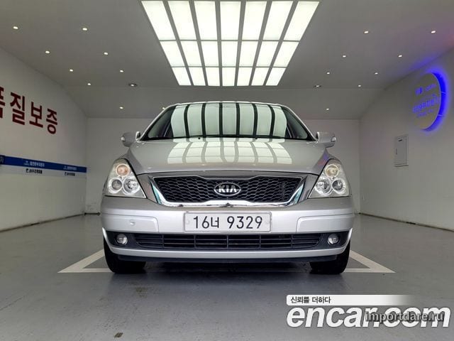 KIA CARNIVAL R 2012 — 249 000 км, серебристый, Корея — под ключ — фото 1