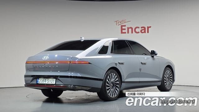 HYUNDAI GRANDEUR HYBRID 2023 — 10 208 км, серебристо-серый, Корея — под ключ — фото 1