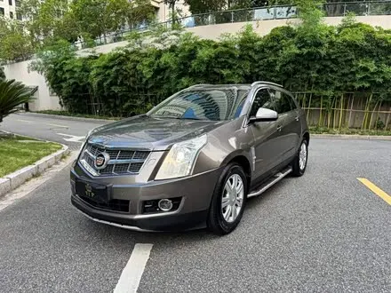 CADILLAC SRX 2013 — 120 000 км, Китай — под ключ — фото 1