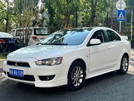 MITSUBISHI LANCER EX 2013 — 120 000 км, Китай — под ключ — фото 1