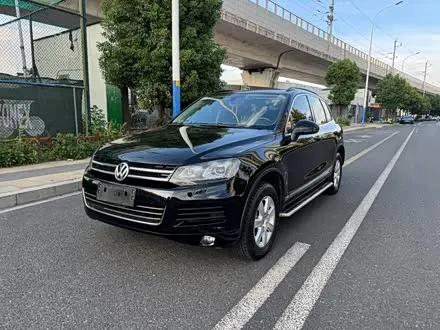 VOLKSWAGEN TOUAREG 2014 — 100 000 км, Китай — под ключ — фото 1