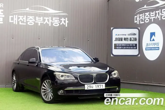 BMW 7 SERIES 2012 — 135 000 км, чёрный, Корея — под ключ — фото 1