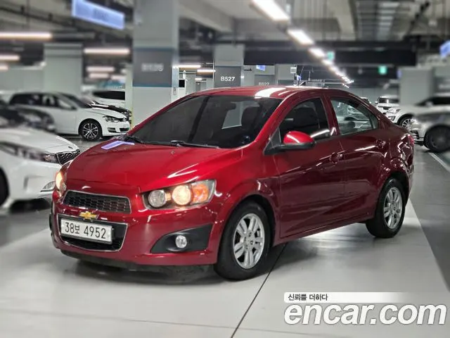 CHEVROLET AVEO SEDAN 2013 — 134 036 км, красный, Корея — под ключ — фото 1