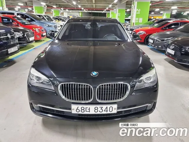 BMW 7 SERIES 2012 — 82 000 км, чёрный, Корея — под ключ — фото 1
