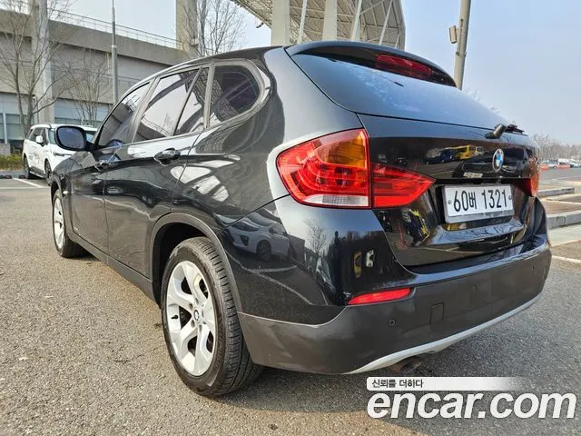 BMW X1 2011 — 300 233 км, чёрный, Корея — под ключ — фото 4