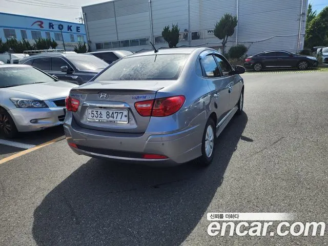 HYUNDAI AVANTE HYBRID 2012 — 176 760 км, серебристо-серый, Корея — под ключ — фото 3