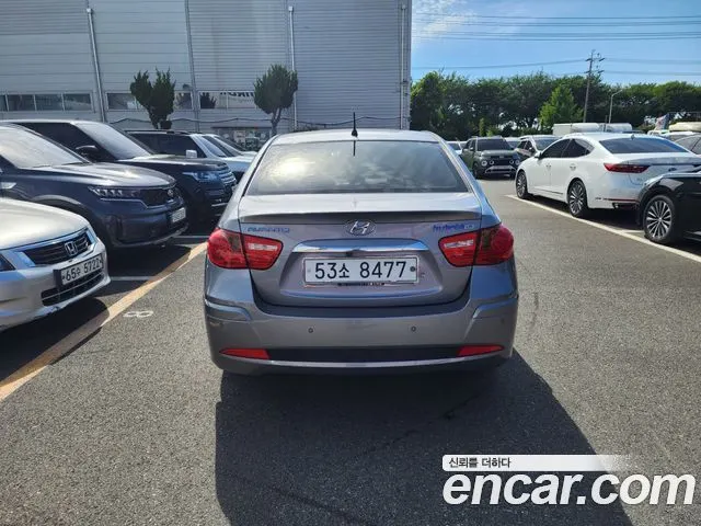 HYUNDAI AVANTE HYBRID 2012 — 176 760 км, серебристо-серый, Корея — под ключ — фото 4