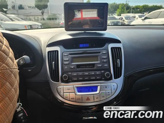 HYUNDAI AVANTE HYBRID 2012 — 176 760 км, серебристо-серый, Корея — под ключ — фото 9