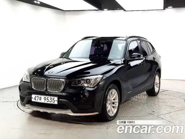 BMW X1 2015 — 116 700 км, чёрный, Корея — под ключ — фото 1