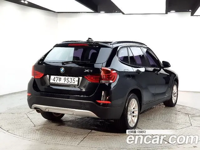 BMW X1 2015 — 116 700 км, чёрный, Корея — под ключ — фото 4