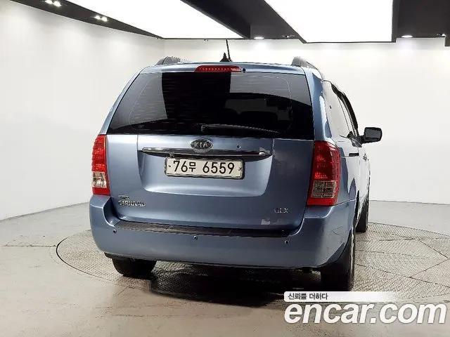 KIA GRAND CARNIVAL 2009 — 86 000 км, синий, Корея — под ключ — фото 2