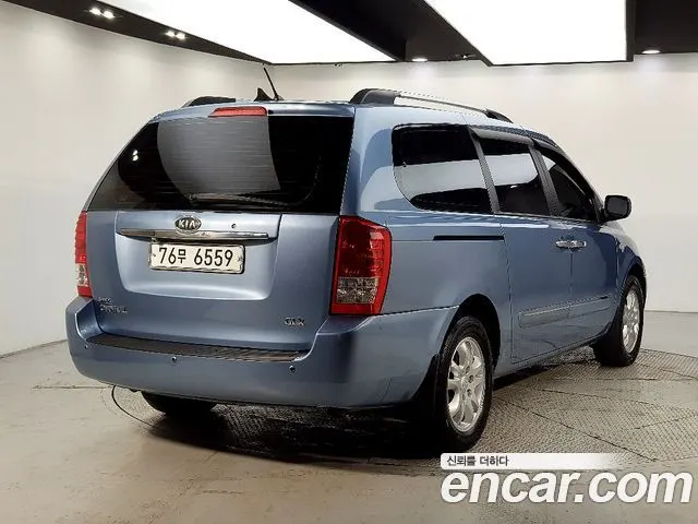 KIA GRAND CARNIVAL 2009 — 86 000 км, синий, Корея — под ключ — фото 3