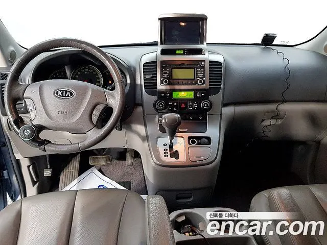 KIA GRAND CARNIVAL 2009 — 86 000 км, синий, Корея — под ключ — фото 4