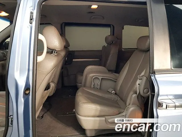 KIA GRAND CARNIVAL 2009 — 86 000 км, синий, Корея — под ключ — фото 7