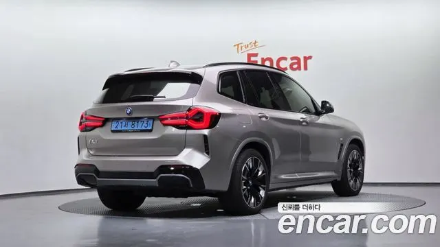 BMW IX3 2024 — 36 325 км, светло-золотистый, Корея — под ключ — фото 1