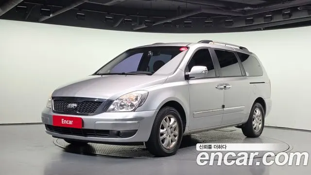 KIA CARNIVAL R 2013 — 165 549 км, серебристый, Корея — под ключ — фото 1