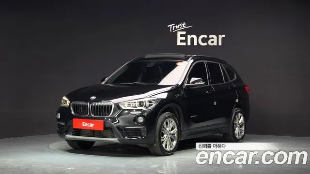 BMW X1 2018 — 94 104 км, чёрный, Корея — под ключ — фото 1