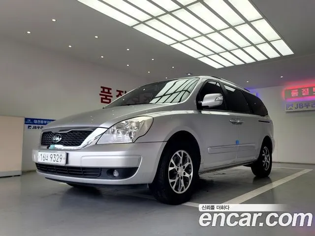KIA CARNIVAL R 2012 — 249 000 км, серебристый, Корея — под ключ — фото 2