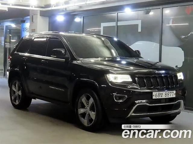 JEEP GRAND CHEROKEE 2015 — 128 742 км, чёрный, Корея — под ключ — фото 12