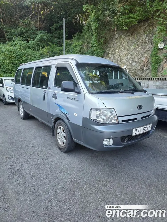 KIA BONGO III 2005 — 240 000 км, серебристо-серый, Корея — под ключ — фото 1